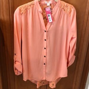 Peach blouse with a fun lacy back!